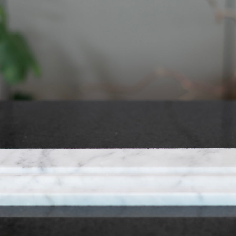 Bianco Carrara sockel 10 cm hög profilerad profil modernahuset.se